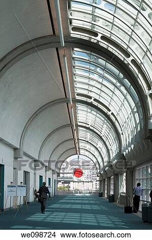 Sparsely populated hallway in San Diego Convention Center with curved glass ceiling. San Diego, California, USA. View Large Photo Image Picture - Sparsely populated hallway in San Diego Convention Center with curved glass ceiling. San Diego, California, USA.. Fotosearch