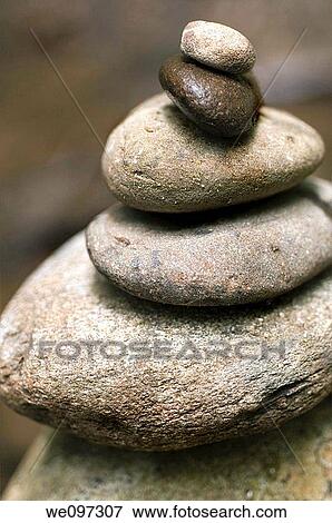 Stock Photo - Stacked River Stones - symbolizing balance and harmony. Fotosearch