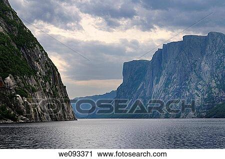 Steep Igneous rock walls at Western Brook Pond inland fjord at Gros Morne National Park Newfoundland View Large Photo Image Stock Image - Steep Igneous rock walls at Western Brook Pond inland fjord at Gros Morne National Park Newfoundland. Fotosearch