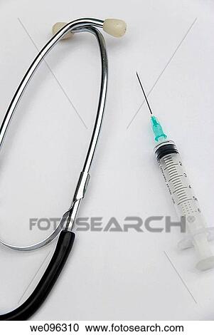 Stethoscope and syringe View Large Photo Image Stock Image - Stethoscope and syringe. Fotosearch