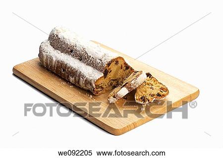 Stollen on cutting board View Large Photo Image Stock Photography - Stollen on cutting board. Fotosearch