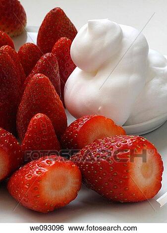 Stock Photograph - Strawberries with whipped cream. Fotosearch