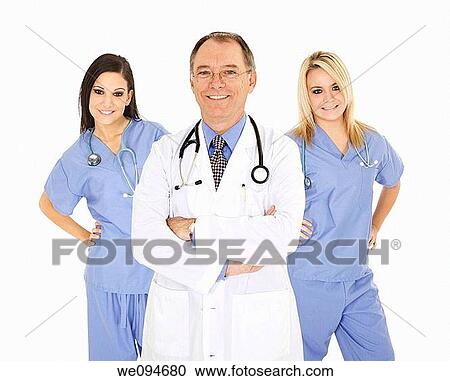 Successful young doctors smiling over a white background View Large Photo Image Stock Image - Successful young doctors smiling over a white background. Fotosearch