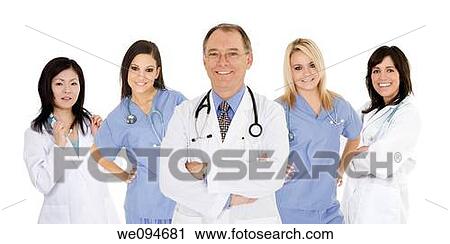 Successful young doctors smiling over a white background View Large Photo Image Stock Image - Successful young doctors smiling over a white background. Fotosearch