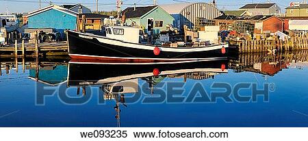 Sunrise with tour boat at Fishermans Cove Eastern Passage Halifax Nova Scotia View Large Photo Image Stock Photography - Sunrise with tour boat at Fishermans Cove Eastern Passage Halifax Nova Scotia. Fotosearch