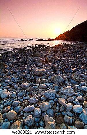 Sunset on the coast of Liencres, Cantabria. Spain. View Large Photo Image Stock Photography - Sunset on the coast of Liencres, Cantabria. Spain.. Fotosearch