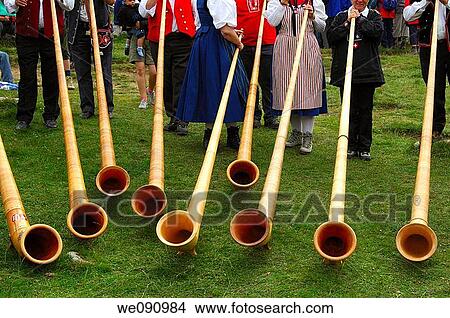 Swiss Alphorns at a Swiss folk festival, Valais, Switzerland View Large Photo Image Picture - Swiss Alphorns at a Swiss folk festival, Valais, Switzerland. Fotosearch