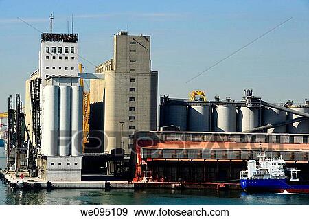 Tanques de grano y semillas a granel para la carga y descarga de buques, puerto de Barcelona, Catalunya, Espa±a View Large Photo Image Stock Photo - Tanques de grano y semillas a granel para la carga y descarga de buques, puerto de Barcelona, Catalunya, Espa±a. Fotosearch