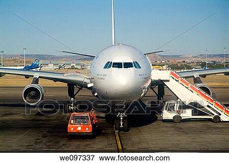 Tarmac and airplanes at Madrid international airport, Spain View Large Photo Image Stock Photo - Tarmac and airplanes at Madrid international airport, Spain. Fotosearch
