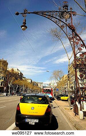 Taxi y farola de estilo modernista en el Passeig de Gr? cia, Eixample, Barcelona, Catalunya, Espa±a View Large Photo Image Stock Photo - Taxi y farola de estilo modernista en el Passeig de Gr? cia, Eixample, Barcelona, Catalunya, Espa±a. Fotosearch