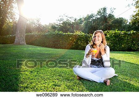 Teen in a garden View Large Photo Image Stock Photo - Teen in a garden. Fotosearch
