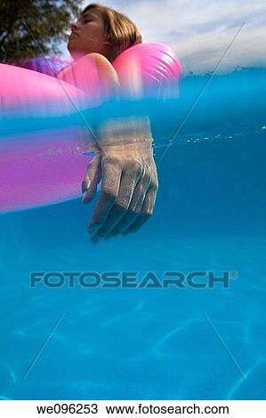 Stock Image - Teen in a pool. Fotosearch