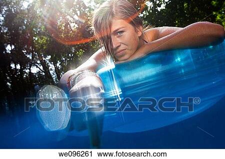 Teen in a pool View Large Photo Image Stock Image - Teen in a pool. Fotosearch