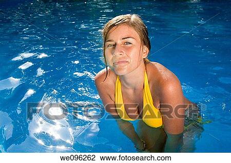 Stock Image - Teen in a pool. Fotosearch