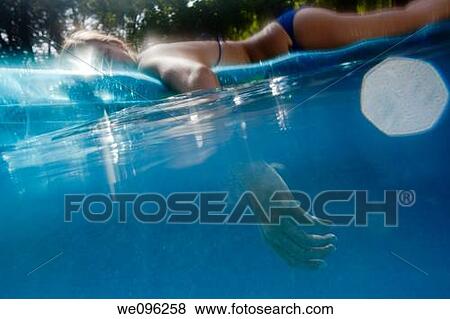 Teen in a pool View Large Photo Image Stock Photo - Teen in a pool. Fotosearch