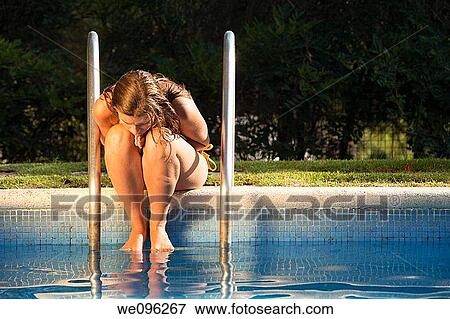 Teen in a pool View Large Photo Image Stock Photo - Teen in a pool. Fotosearch
