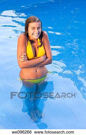 Stock Photograph - Teen in a pool. Fotosearch