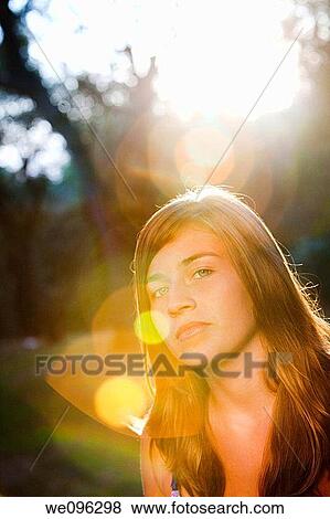 Teen in sunset View Large Photo Image Stock Photo - Teen in sunset. Fotosearch