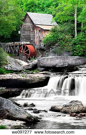 Stock Photo - The Beautiful historic Glade Creek Grist Mill after the spring rains Located in Babcock State Park, West Virginia. Fotosearch