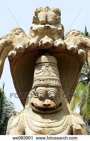 The Lakshmi-Narasimha in Hampi, popularly called Ugranarasimha, was executed in 1528 A. D. during the rule of Krishnadevaraya. Originally, the icon bore a smaller image of Lakshmi sitting on his lap. This gigantic image is 6. 7 meters in height. He is seate View Large Photo Image Stock Image - The Lakshmi-Narasimha in Hampi, popularly called Ugranarasimha, was executed in 1528 A. D. during the rule of Krishnadevaraya. Originally, the icon bore a smaller image of Lakshmi sitting on his lap. This gigantic image is 6. 7 meters in height. He is seate. Fotosearch