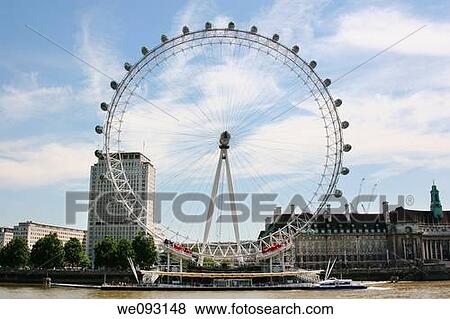 The millenium wheel, London eye on the River Thames in london View Large Photo Image Stock Photo - The millenium wheel, London eye on the River Thames in london. Fotosearch