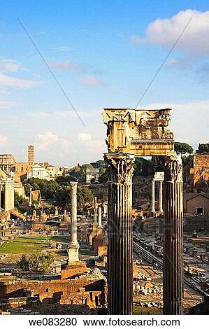 The remains of the Temple of Vespasian and Titus and the Temple of Saturn in the Roman Forum, Rome, Italy View Large Photo Image Stock Image - The remains of the Temple of Vespasian and Titus and the Temple of Saturn in the Roman Forum, Rome, Italy. Fotosearch