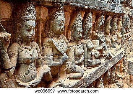 The Terrace of the Leper King is located in the northwest corner of the Royal Square of Angkor Thom, which is part of the Ankgor Wat complex in northern Cambodia View Large Photo Image Stock Photo - The Terrace of the Leper King is located in the northwest corner of the Royal Square of Angkor Thom, which is part of the Ankgor Wat complex in northern Cambodia. Fotosearch