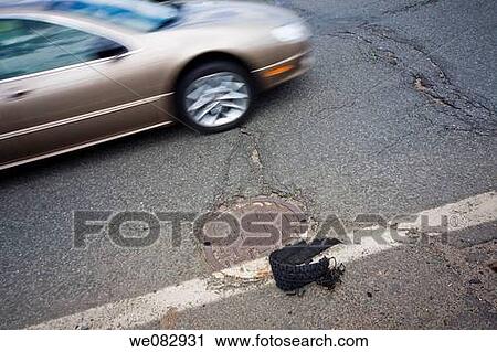 Tire tread on the highway beside a speeding automobile. View Large Photo Image Stock Image - Tire tread on the highway beside a speeding automobile.. Fotosearch