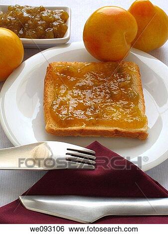Toast with yellow plum jam View Large Photo Image Stock Photograph - Toast with yellow plum jam. Fotosearch