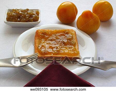 Toast with yellow plum jam View Large Photo Image Stock Photography - Toast with yellow plum jam. Fotosearch