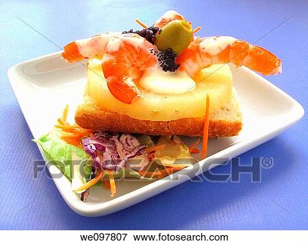 Stock Photo - Toasted bread, fresh pineapple and prawns with mayonnaise. Fotosearch