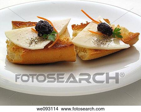 Toasted bread with olive oil, cheese and eggs Lumpo View Large Photo Image Picture - Toasted bread with olive oil, cheese and eggs Lumpo. Fotosearch