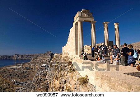 Tourists sightseeing at the Acropolis, Lindos, Rhodes, Greece View Large Photo Image Stock Photo - Tourists sightseeing at the Acropolis, Lindos, Rhodes, Greece. Fotosearch