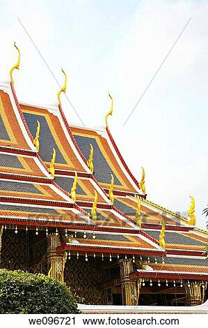 Traditional structures decorated in gold at the Grand Palace in Bangkok Thailand View Large Photo Image Stock Image - Traditional structures decorated in gold at the Grand Palace in Bangkok Thailand. Fotosearch