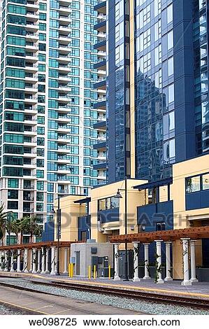 Train station in front of tall modern residential building in San Diego View Large Photo Image Stock Photography - Train station in front of tall modern residential building in San Diego. Fotosearch
