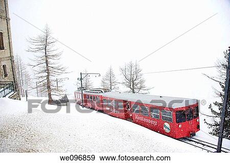 Train to Mer de Glace, a glacier in Rhone Alpes in a snowstorm, France, near of Chamonix View Large Photo Image Stock Photo - Train to Mer de Glace, a glacier in Rhone Alpes in a snowstorm, France, near of Chamonix. Fotosearch
