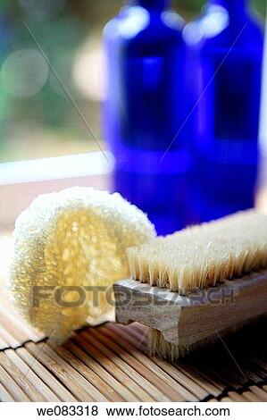 two blue glass bottles, sponge and brush in the bathroom View Large Photo Image Stock Photo - two blue glass bottles, sponge and brush in the bathroom. Fotosearch