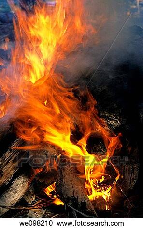 Vanuatu tanna island sulphur bay village close up of flames coming out a traditional oven cooking the national lap lap meal View Large Photo Image Stock Image - Vanuatu tanna island sulphur bay village close up of flames coming out a traditional oven cooking the national lap lap meal. Fotosearch