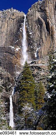 Stock Image - Vertical panorama of the Upper and Lower Yosemite Falls in winter. Fotosearch