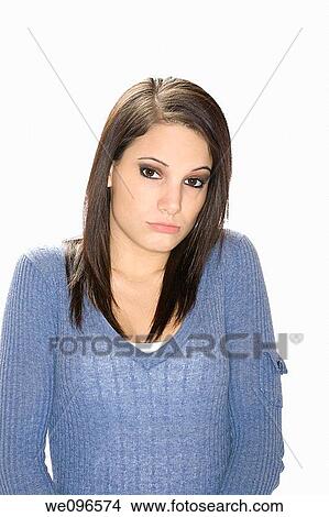 Picture - Very depressed Caucasian woman on a white background. Fotosearch