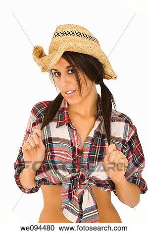 Very sexy Caucasian woman dresses as a cowgirl standing on white background View Large Photo Image Stock Image - Very sexy Caucasian woman dresses as a cowgirl standing on white background. Fotosearch
