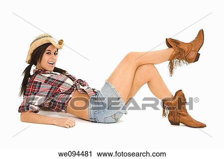 Very sexy Caucasian woman dresses as a cowgirl laying on white background View Large Photo Image Stock Image - Very sexy Caucasian woman dresses as a cowgirl laying on white background. Fotosearch