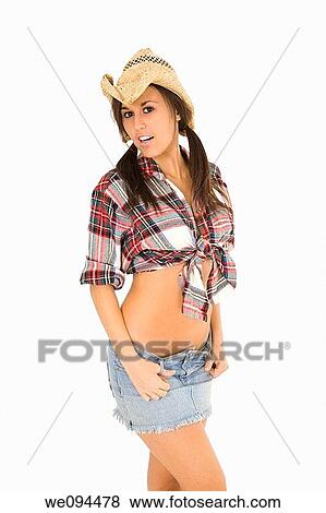 Very sexy Caucasian woman dresses as a cowgirl standing on white background View Large Photo Image Stock Photo - Very sexy Caucasian woman dresses as a cowgirl standing on white background. Fotosearch