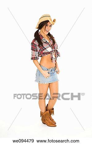 Very sexy Caucasian woman dresses as a cowgirl standing on white background View Large Photo Image Stock Photo - Very sexy Caucasian woman dresses as a cowgirl standing on white background. Fotosearch