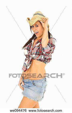 Very sexy Caucasian woman dresses as a cowgirl standing on white background View Large Photo Image Stock Photograph - Very sexy Caucasian woman dresses as a cowgirl standing on white background. Fotosearch