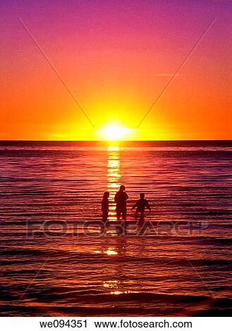 Wading in the ocean water at sunset, Rock Harbor, Cape Cod, MA View Large Photo Image Stock Image - Wading in the ocean water at sunset, Rock Harbor, Cape Cod, MA. Fotosearch
