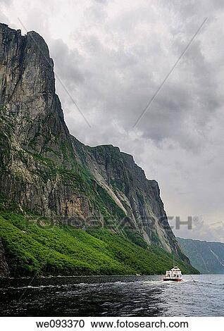 Western Brook Pond boat tour with steep cliff fjords at Gros Morne National Park Newfoundland View Large Photo Image Stock Image - Western Brook Pond boat tour with steep cliff fjords at Gros Morne National Park Newfoundland. Fotosearch