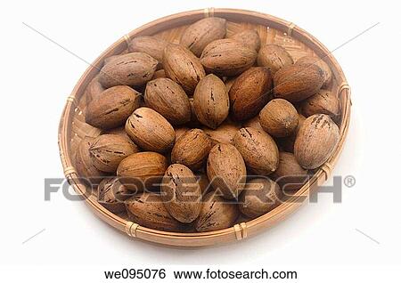 Whole Pecan Nuts in a straw dish on white background View Large Photo Image Stock Photograph - Whole Pecan Nuts in a straw dish on white background. Fotosearch