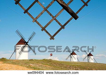 Windmills and windmill arm. Mota del Cuervo, Cuenca province, Castilla La Mancha, Spain. View Large Photo Image Picture - Windmills and windmill arm. Mota del Cuervo, Cuenca province, Castilla La Mancha, Spain.. Fotosearch