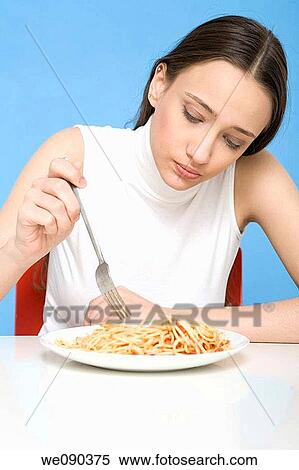 Woman Eating Spaghetti View Large Photo Image Stock Photography - Woman Eating Spaghetti. Fotosearch